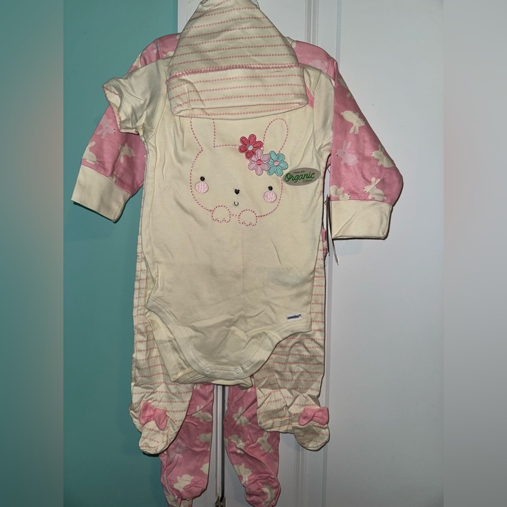 4 piece Organic Baby Onesie and footie set